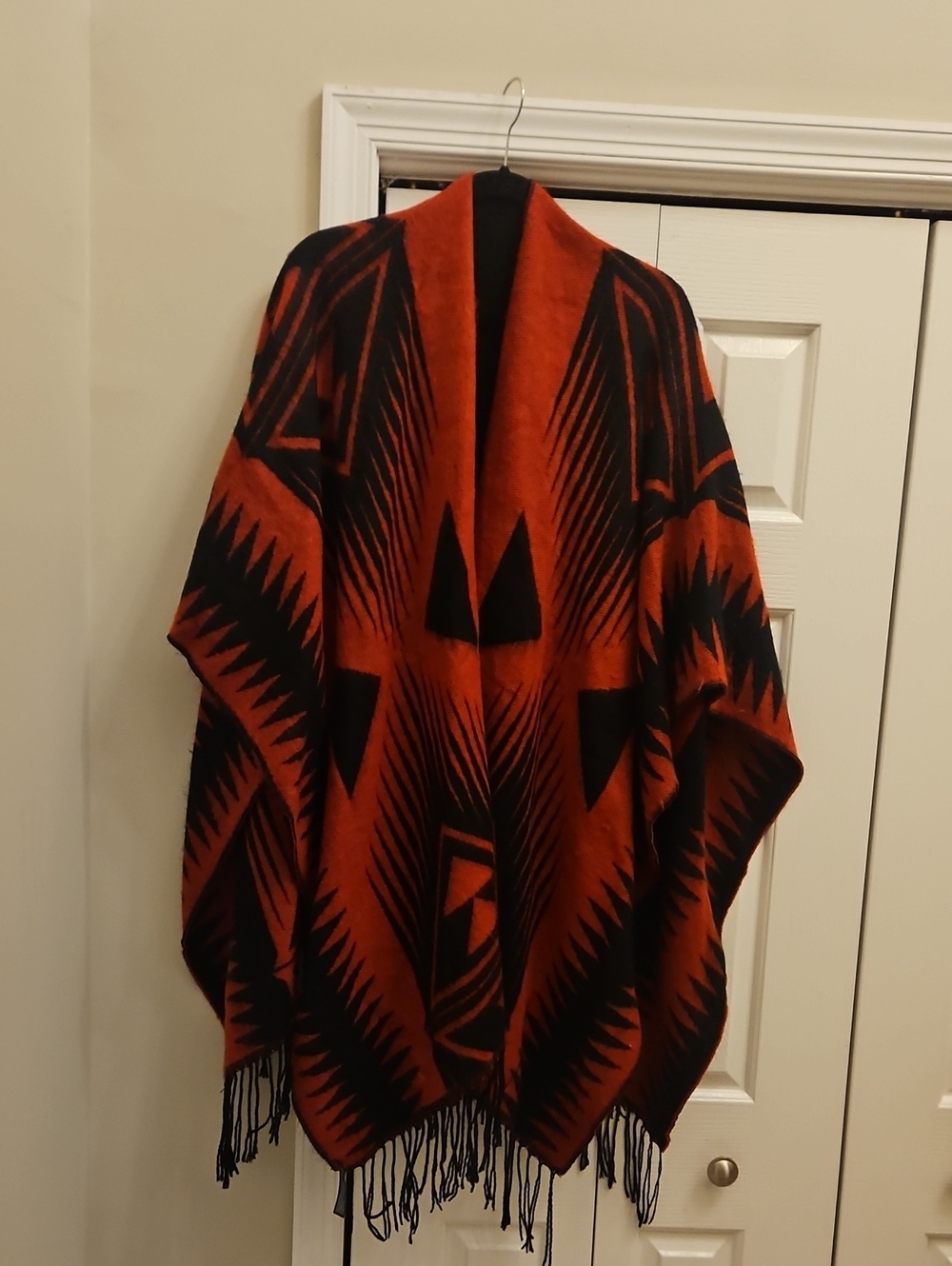 Poncho-like textile hanging